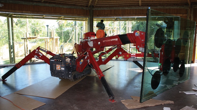 SPYDERCRANE mini crawler crane lifting and handling glass