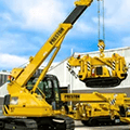 Yellow MAEDA Crawler Cranes in yard