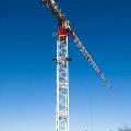 Terex crane with wire rope working on buildings