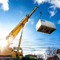 Mobile crane rentals moving container