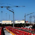 Four self erecting tower crane rentals at a large site