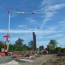 Self erecting tower crane getting service done on site